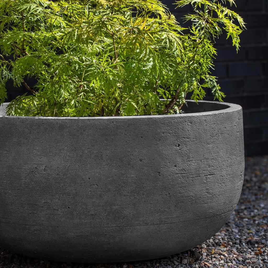 http://campaniainternational.com/cdn/shop/products/p764-low-tribeca-planter-cast-stone-planters-gs-alt1_1200x1200.jpg?v=1697802297